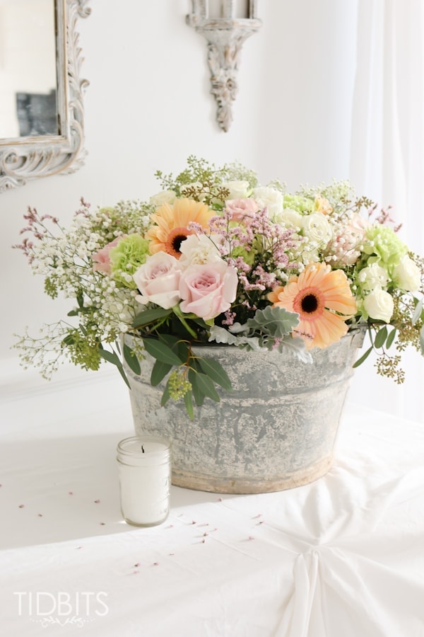 bouquet of flowers in DIY bucket plant holder