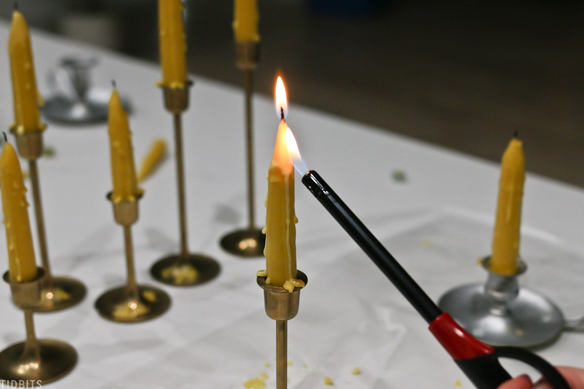 use a lighter to make drips along your candle for some old world character