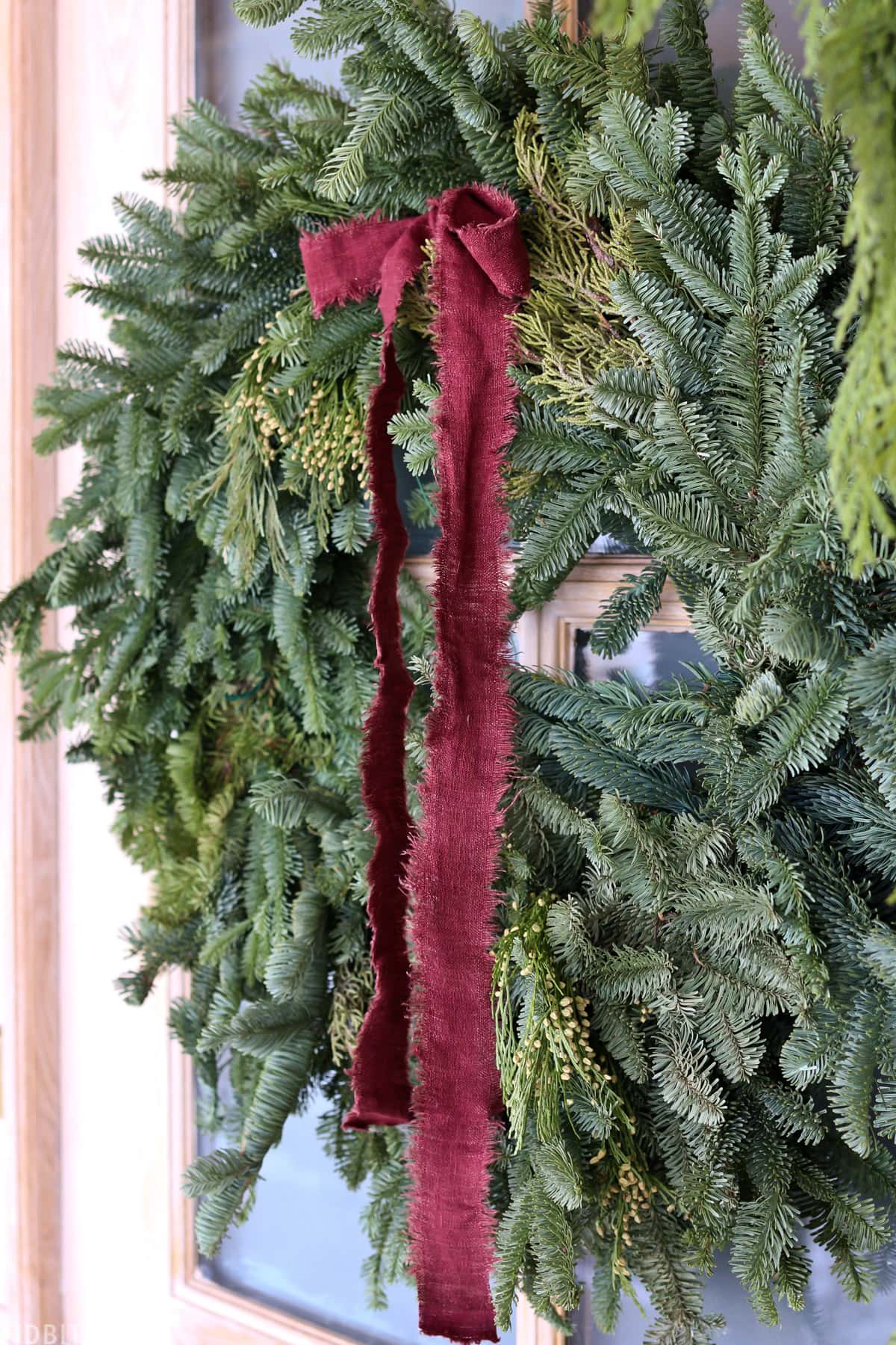 fresh pine wreath with red bow