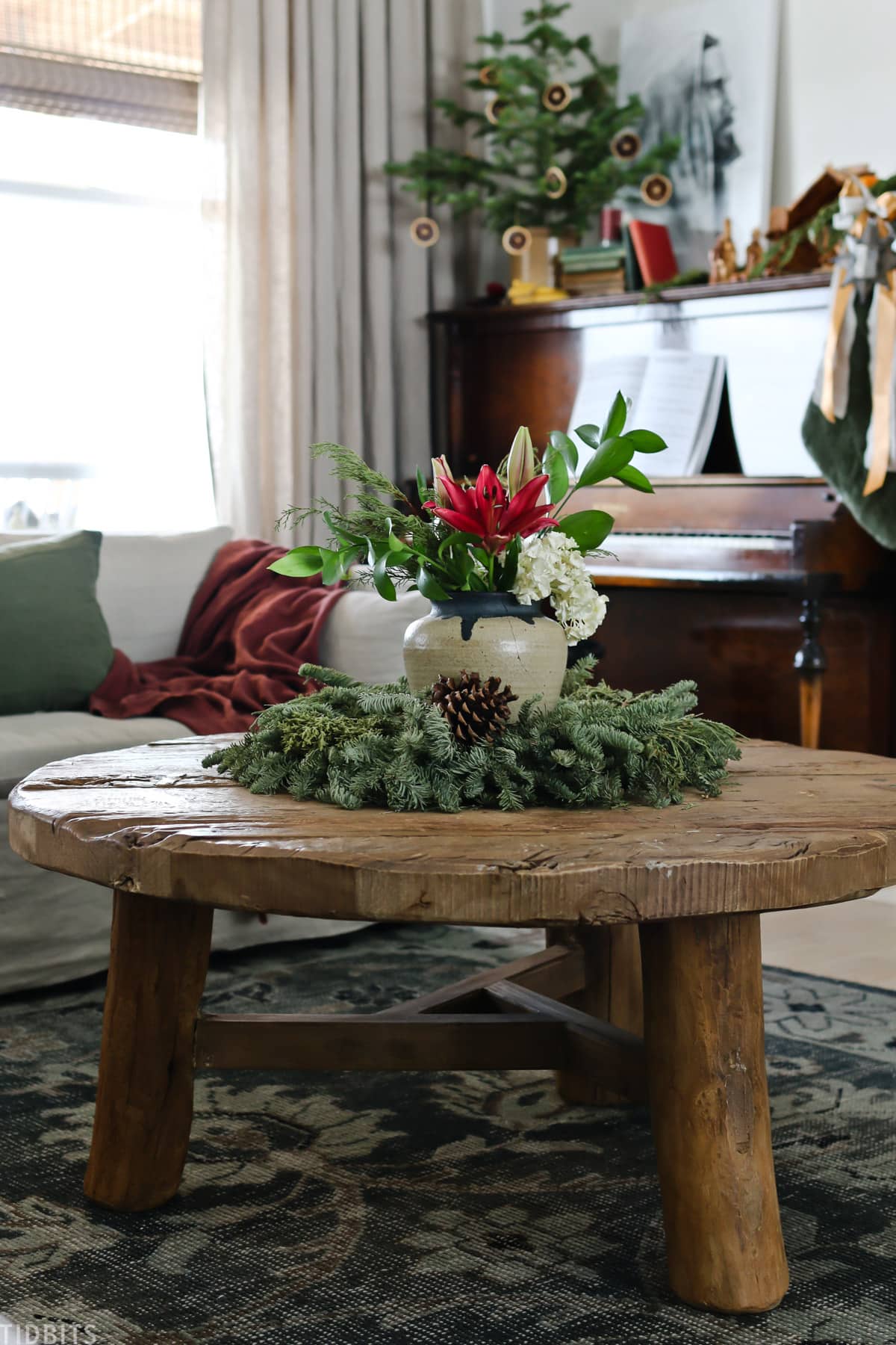christmas flower arrangement inside a wreath