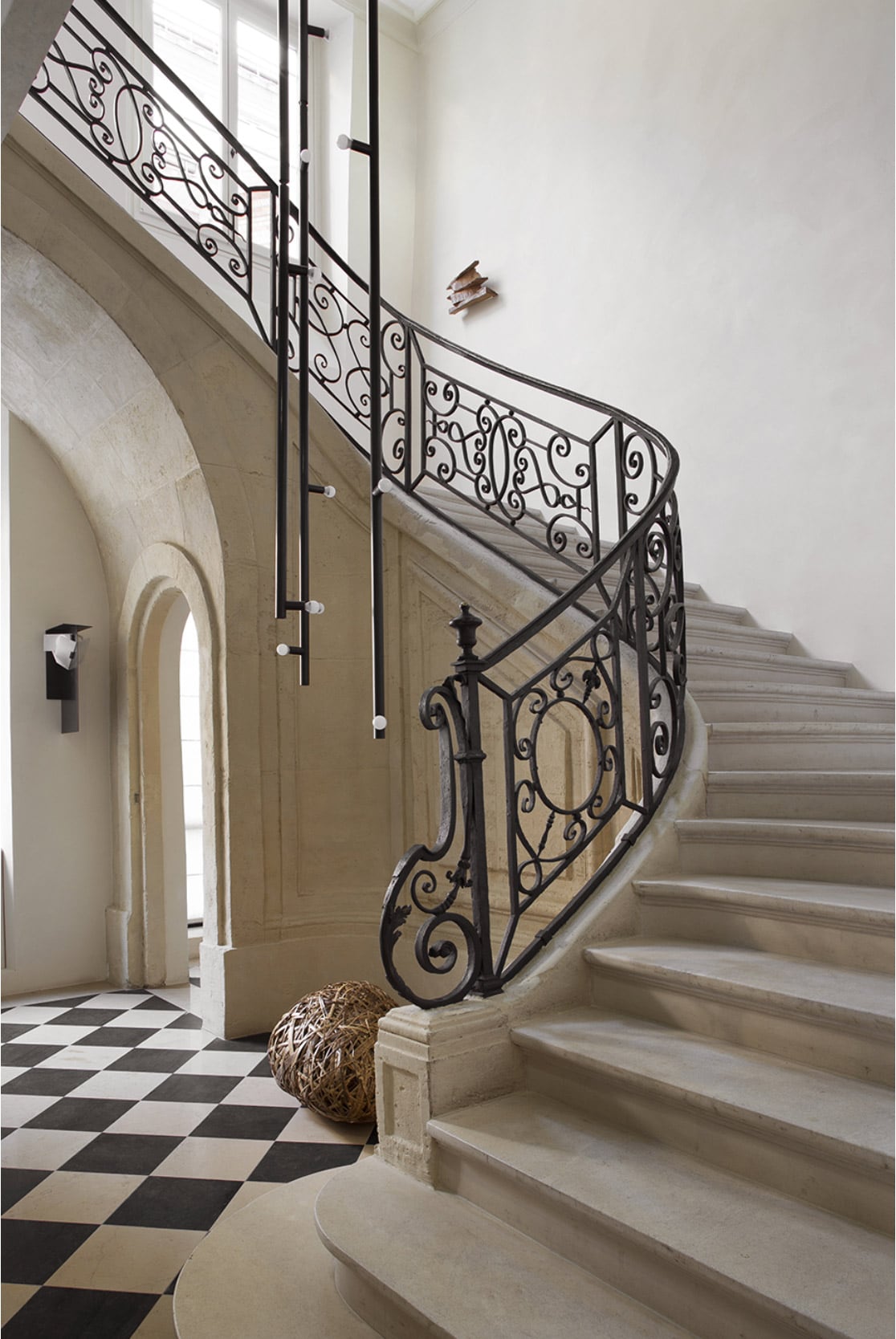 old-world entryway with stone staircase and marble flooring