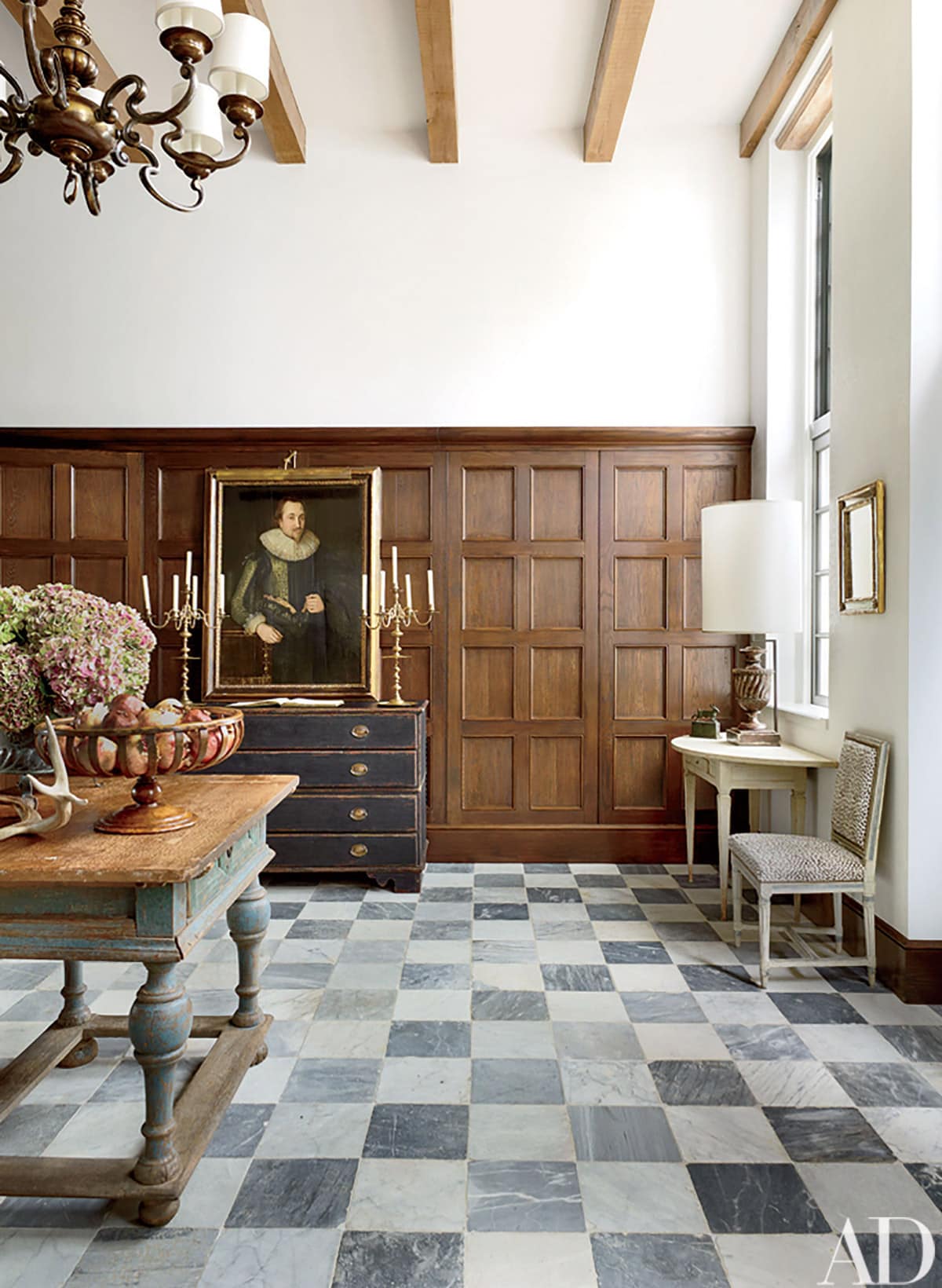 rustic black and white floor tiles in an old-world European living space