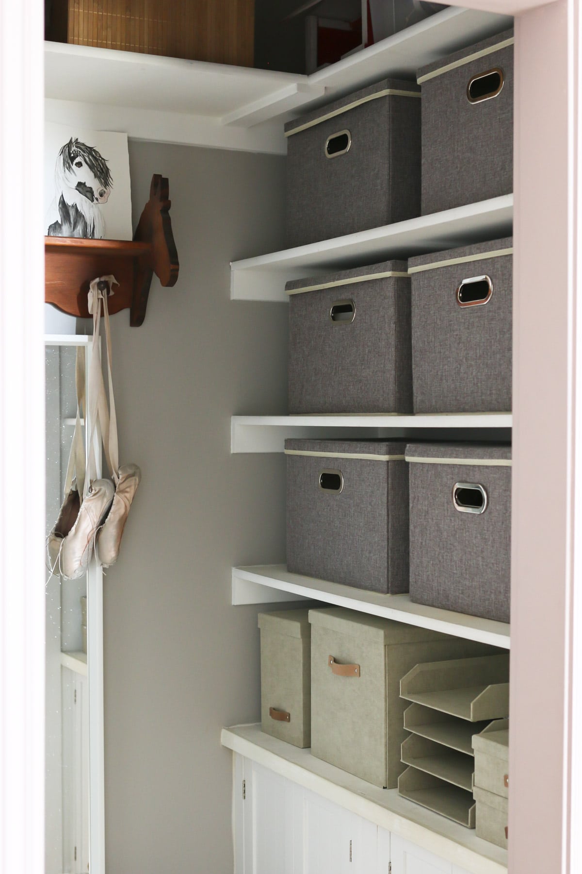 linen storage boxes in closet