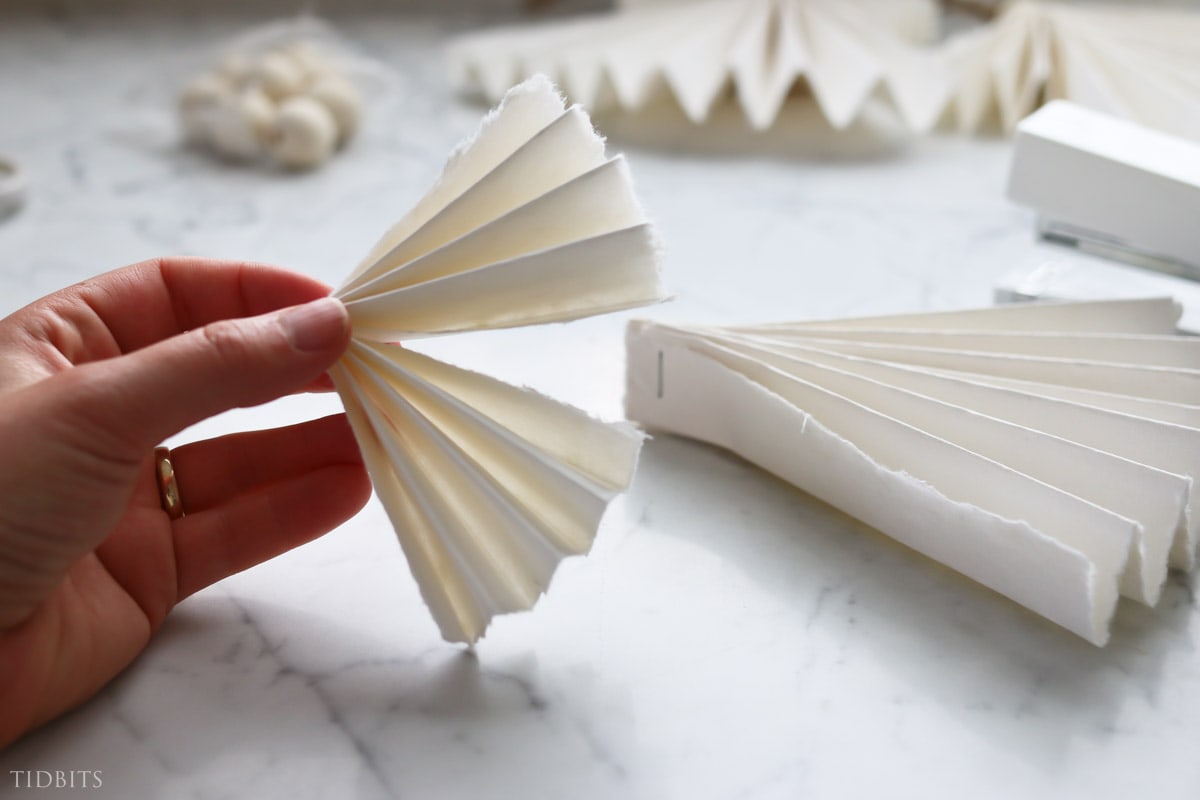 steps to making a paper angel ornament