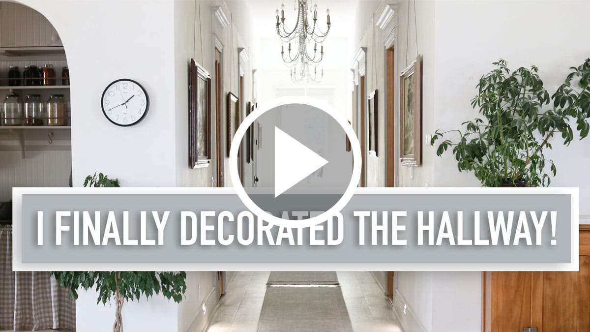 YouTube thumbnail of decorated hall with large art