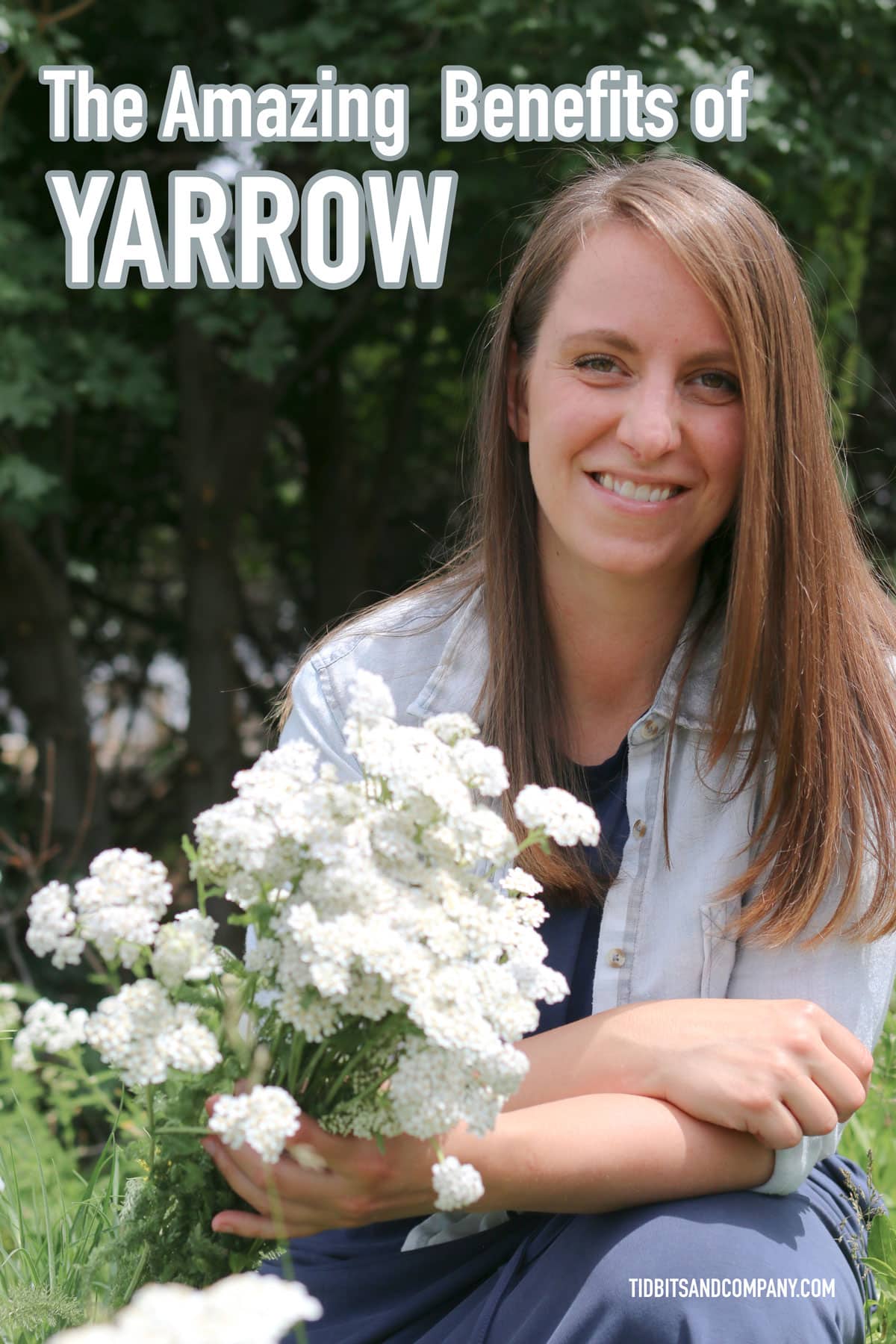 Woman pictured with white yarrow flowers