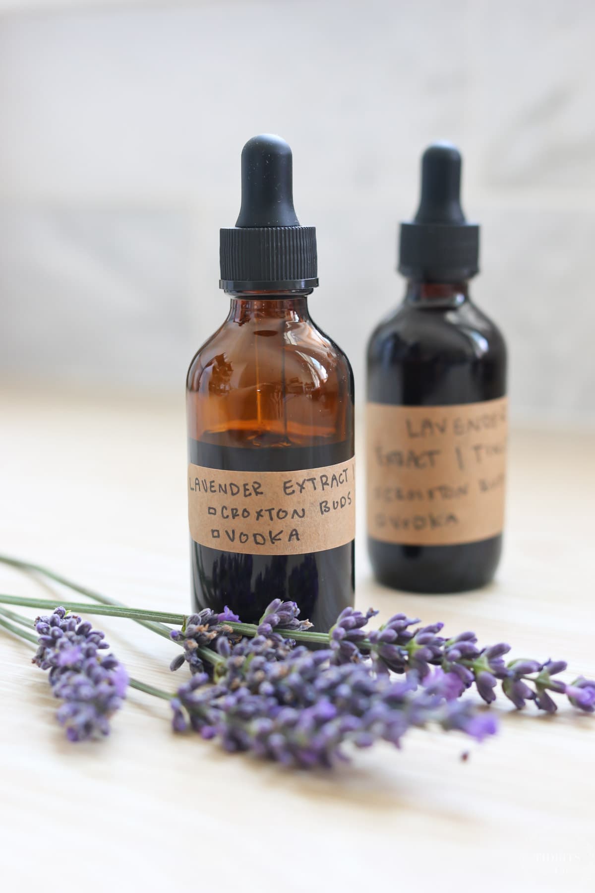 Lavender extract and lavender tincture in brown glass bottles