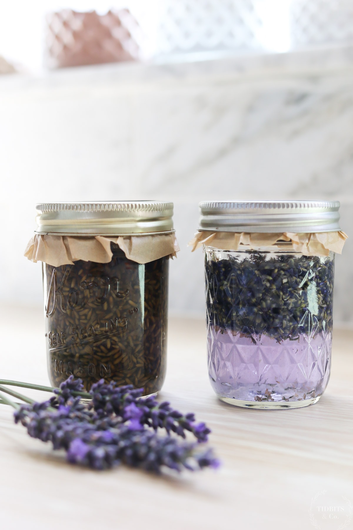 Glass jars of lavender extract