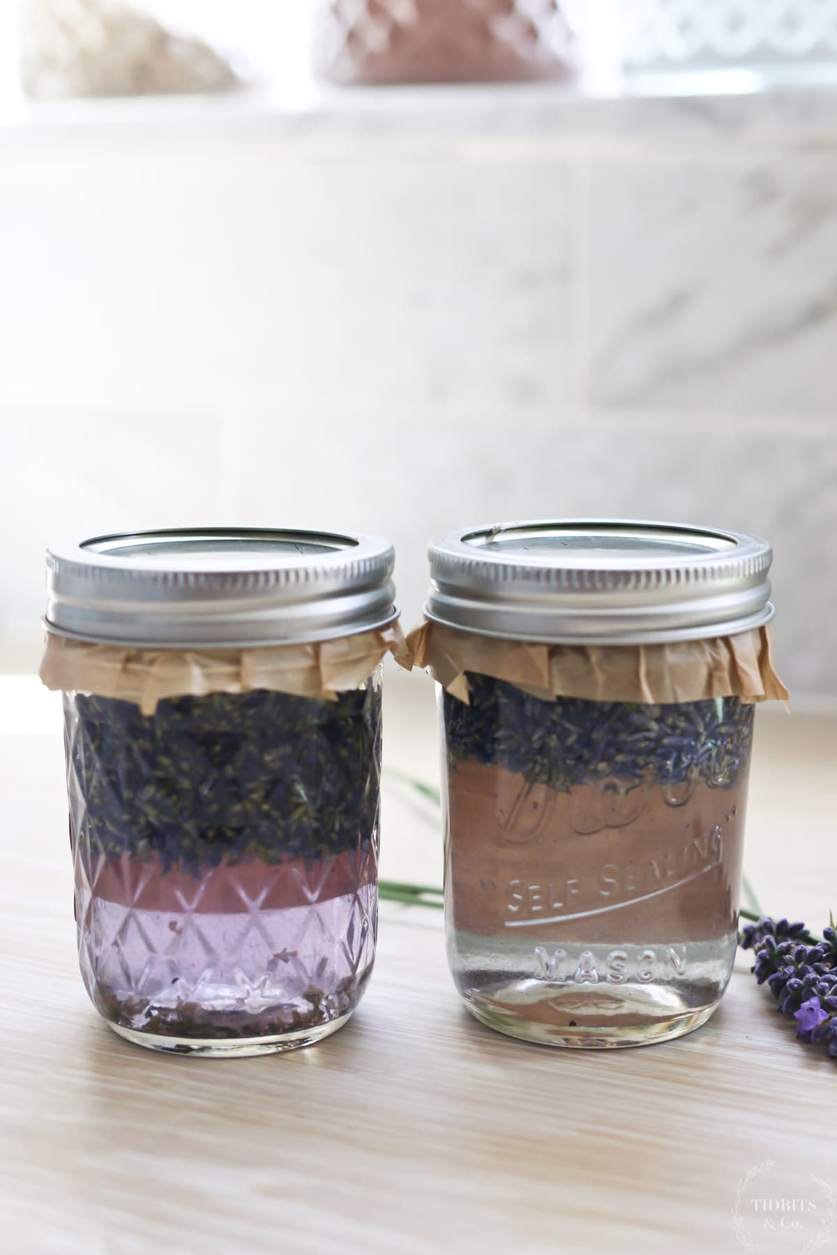 Glass jars of finished lavender extract
