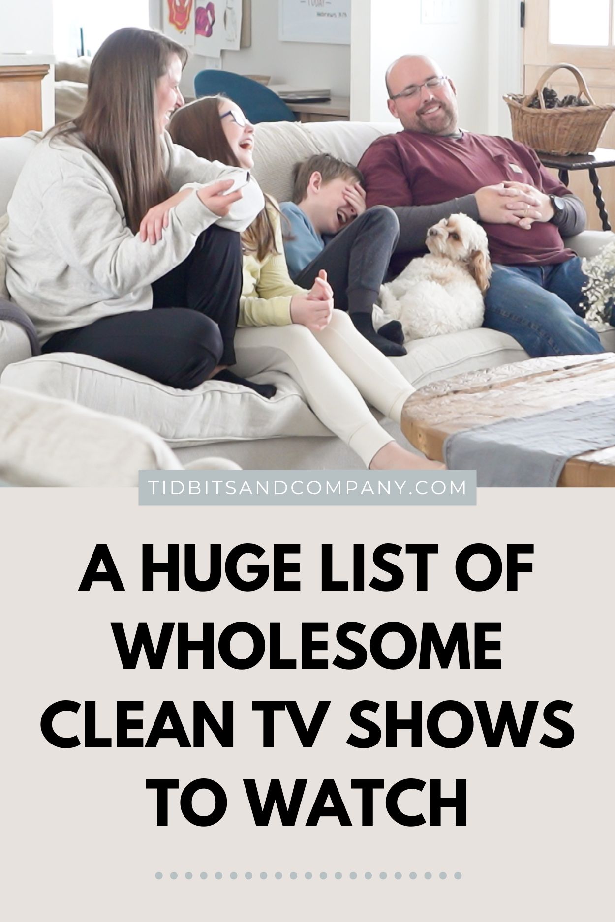 A family laughs while watching clean, family-friendly tv shows