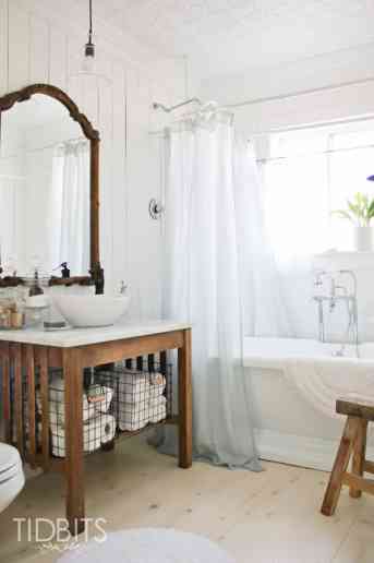 Cottage Bathroom makeover by TIDBITS. A dull and dingy bathroom gets a complete gut job and charming makeover.