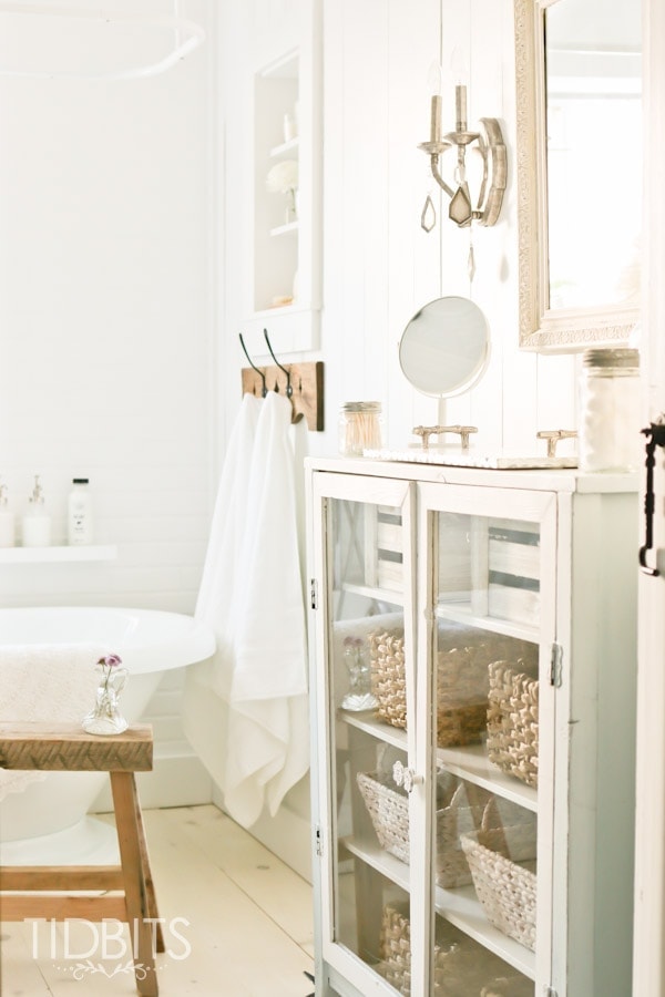 Cottage Bathroom makeover by TIDBITS. A dull and dingy bathroom gets a complete gut job and charming makeover.