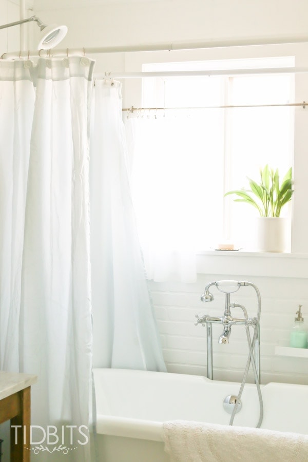 How to make a store bought window curtain work as a shower curtain.