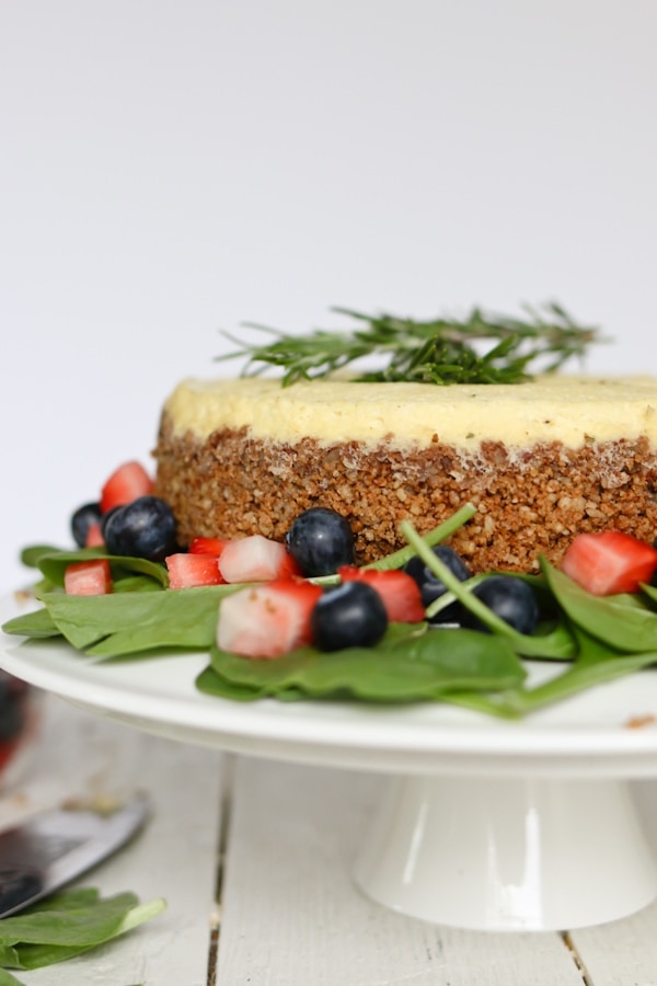 Cheesecake for dinner?! Enjoy this savory blue cheese cheesecake on top of a strawberry spinach salad and drizzled with a sweet balsamic vinaigrette.