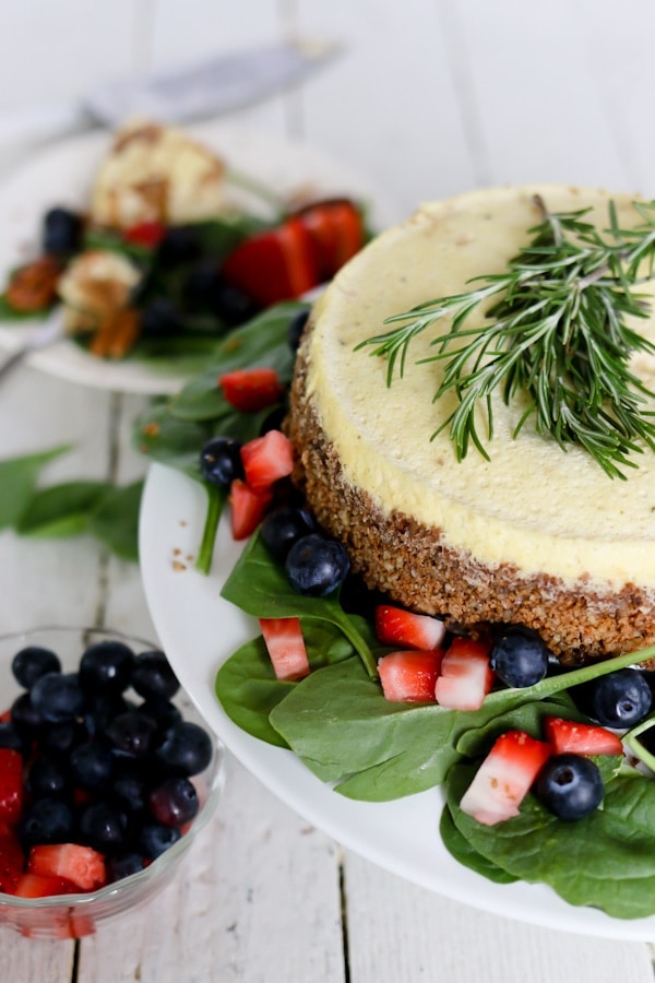 Cheesecake for dinner?! Enjoy this savory blue cheese cheesecake on top of a strawberry spinach salad and drizzled with a sweet balsamic vinaigrette.