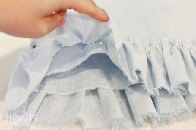 DIY Ruffle Pillowcase by TIDBITS. Learn how to custom make a double-sided ruffled pillow covering for any pillow of your choice.