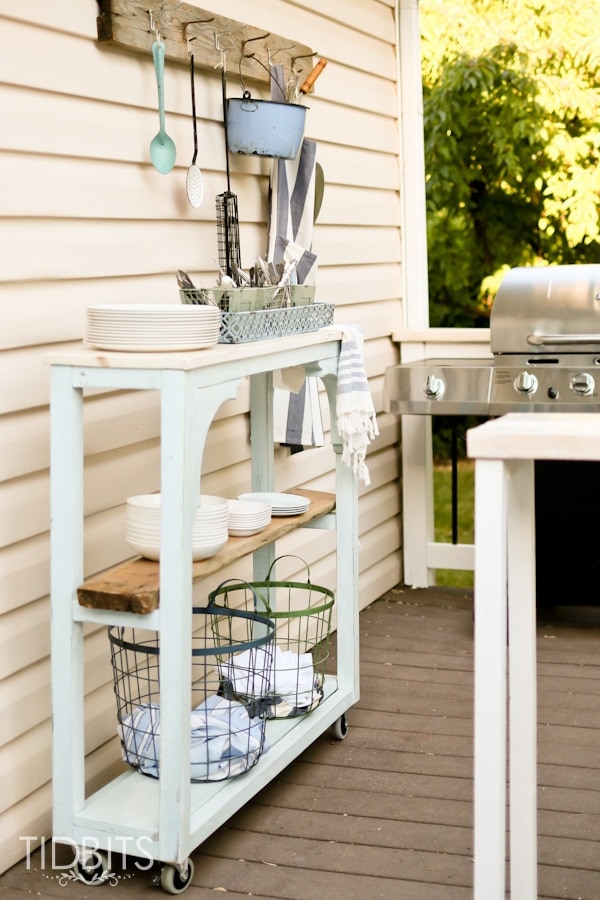 Outdoor grill area and rolling cart serving station.  Deck makeover by TIDBITS.