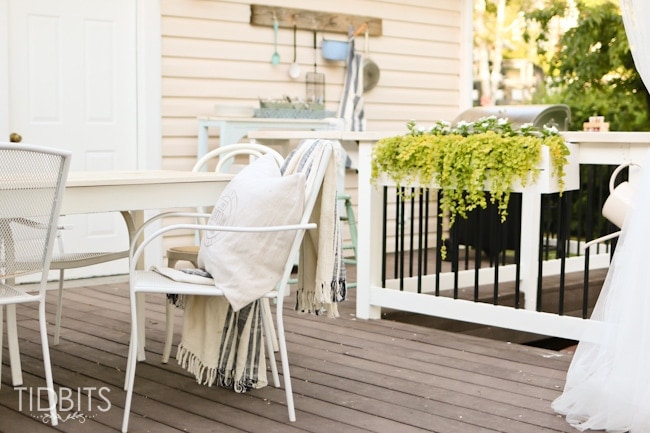Outdoor dining and furniture for a deck.  Deck makeover by TIDBITS.