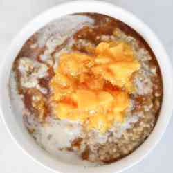 Peaches and Cream Steel Cut Oats with Cinnamon Maple Drizzle
