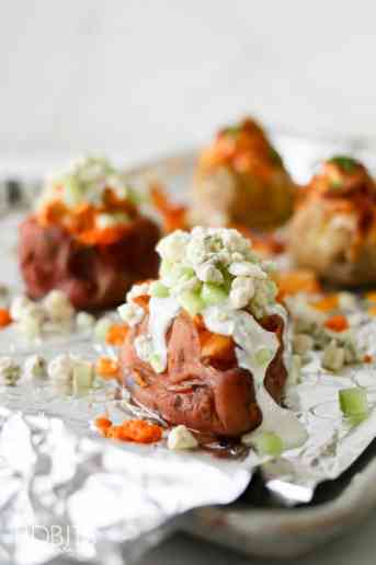 Pressure Cooker Buffalo Chicken Stuffed Potatoes - delicious on russet or sweet potatoes.
