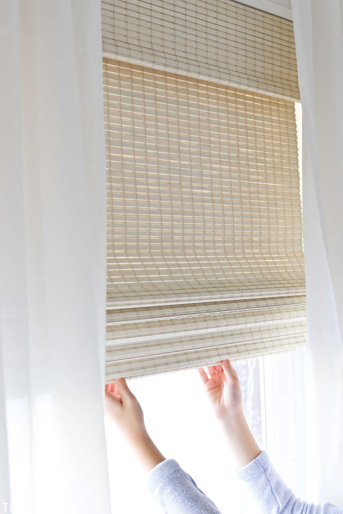 Our beautiful natural woven shades for our home office.