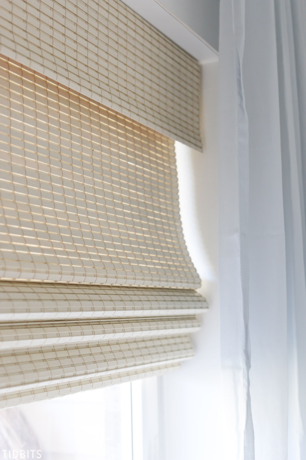 Our beautiful natural woven shades for our home office.