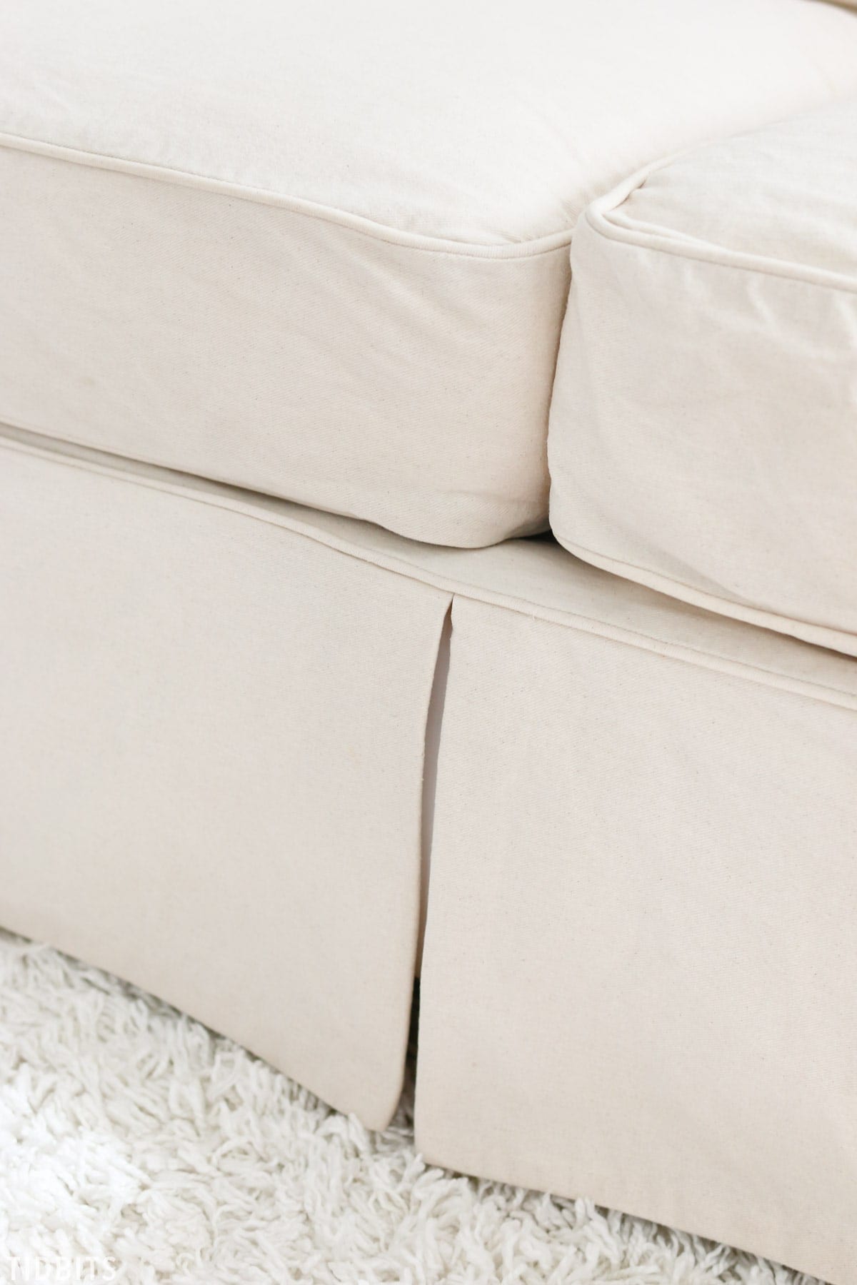 Tips and tricks for cleaning slipcovers naturally. 4 kids + white sofa . . . no problem!