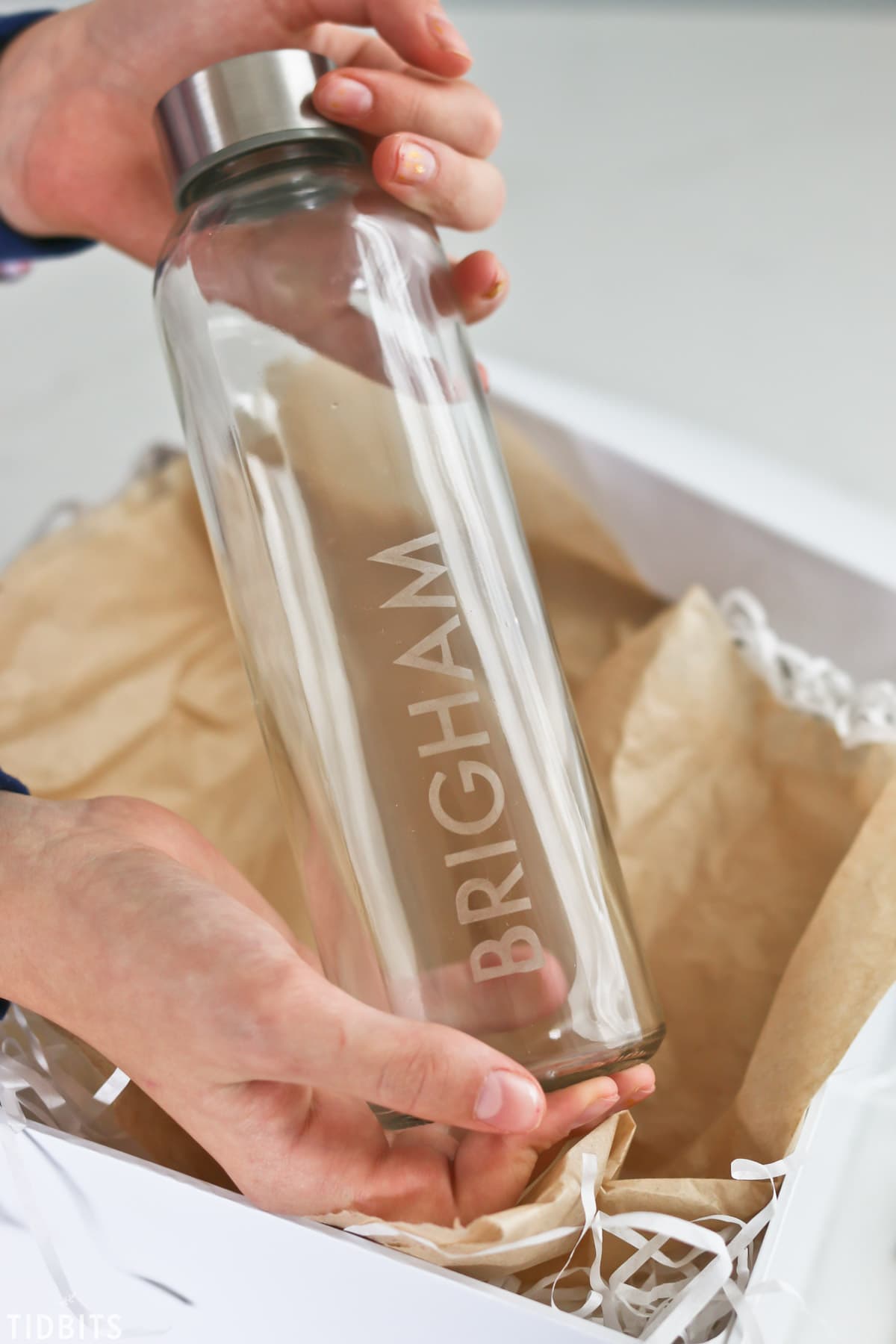 Personalized name etched on glass water bottles, gift idea.