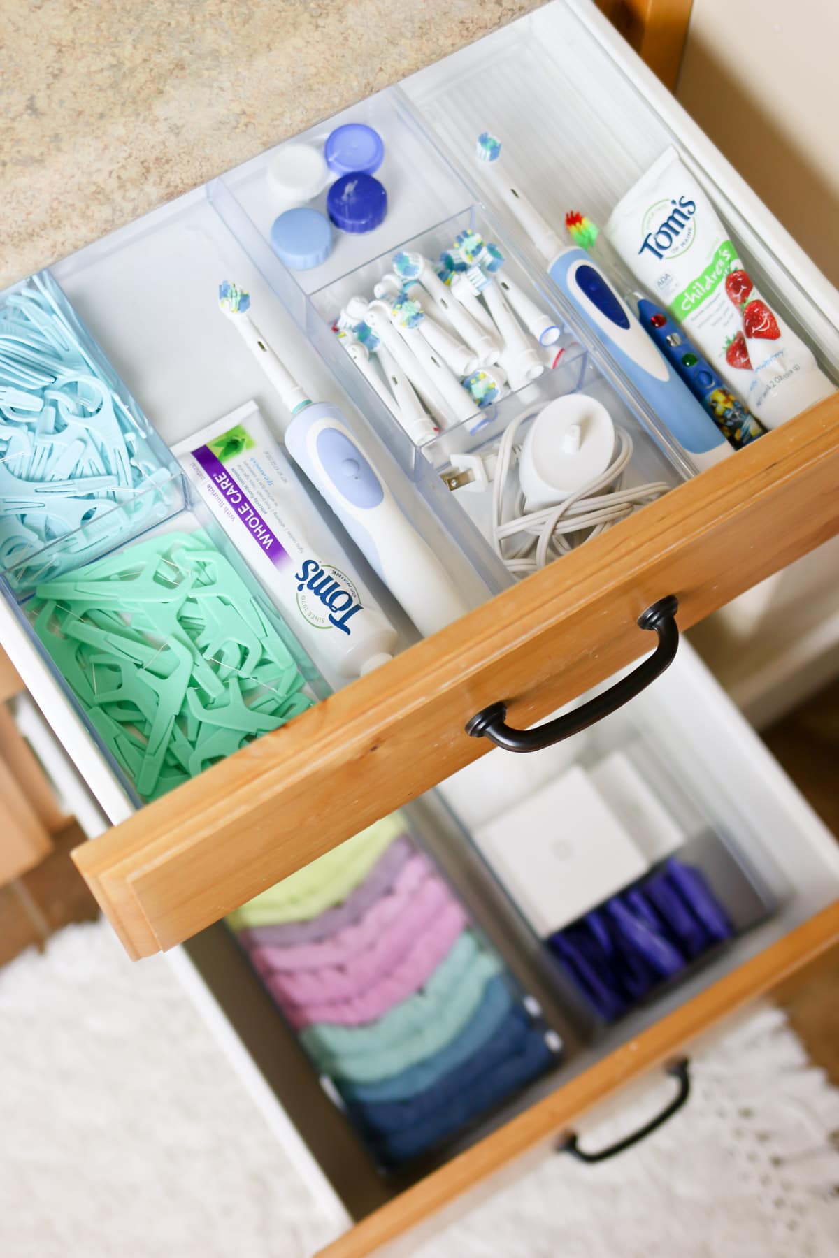 Supplies, tips and ideas for organizing bathroom drawers and cupboards.