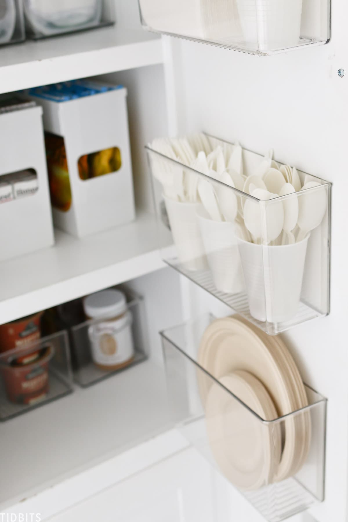 Storing paper products on the cabinet door fronts