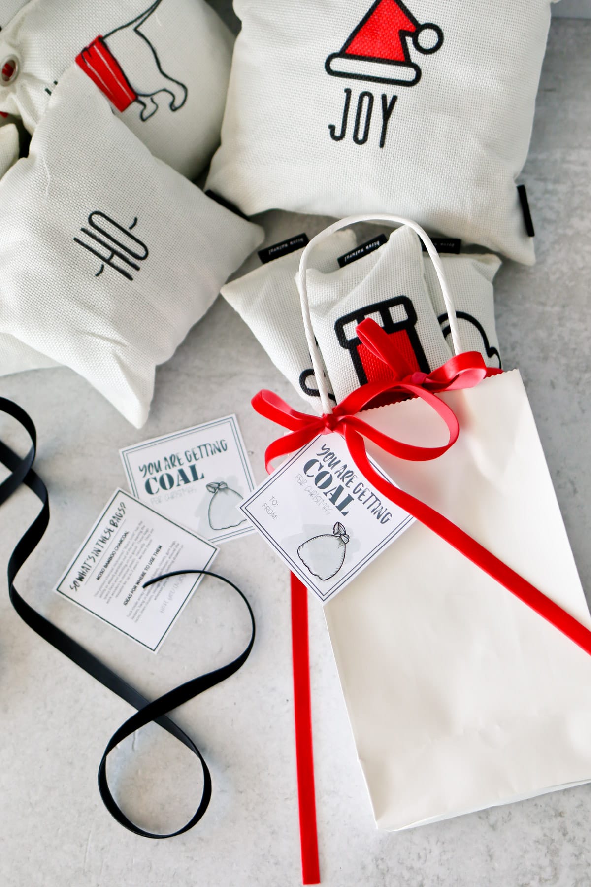 You are getting coal for Christmas, FREE printable gift tags on white christmas sock bags
