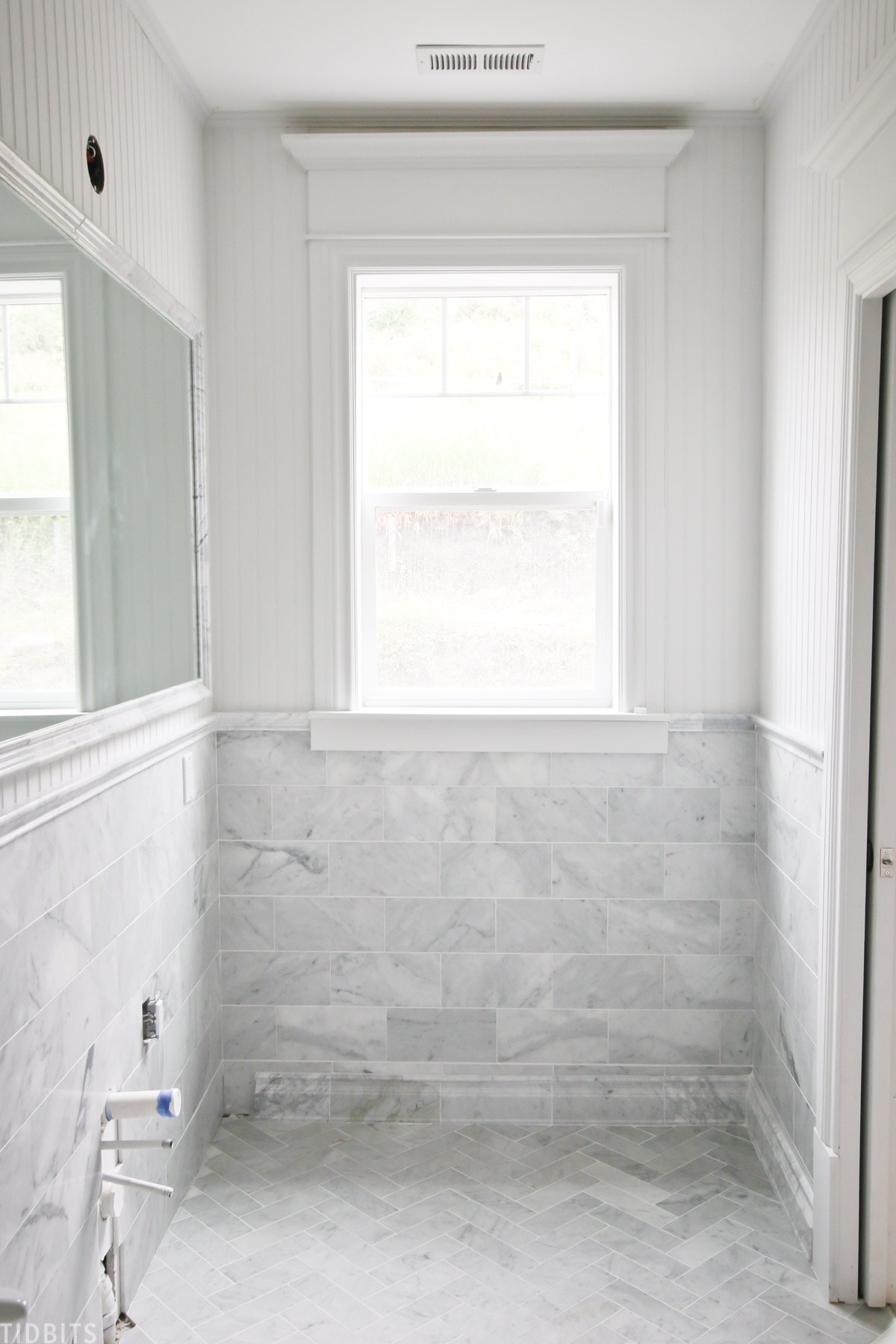 Installing marble tile in bathroom