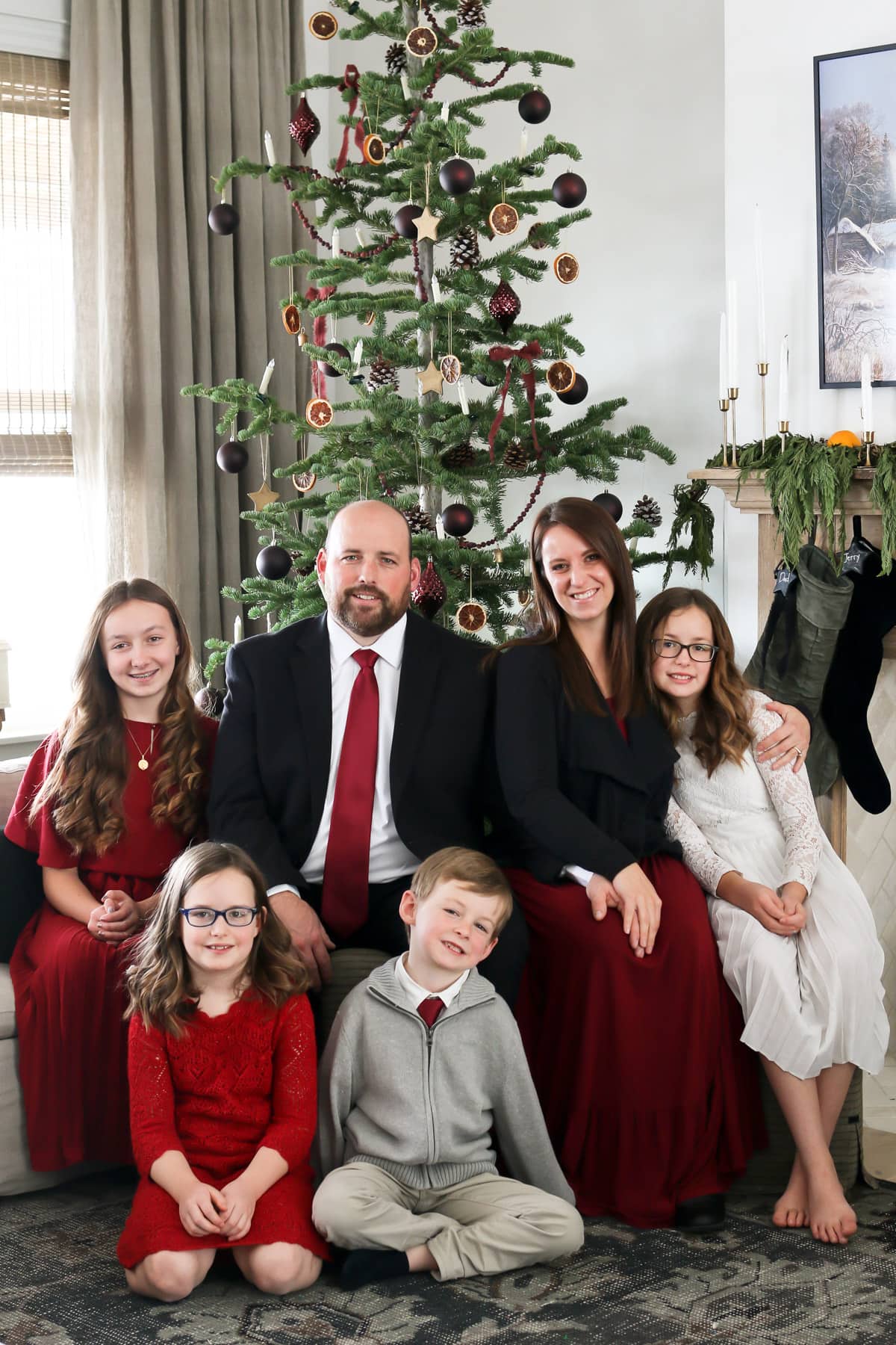 Christmas family photo around the christmas tree