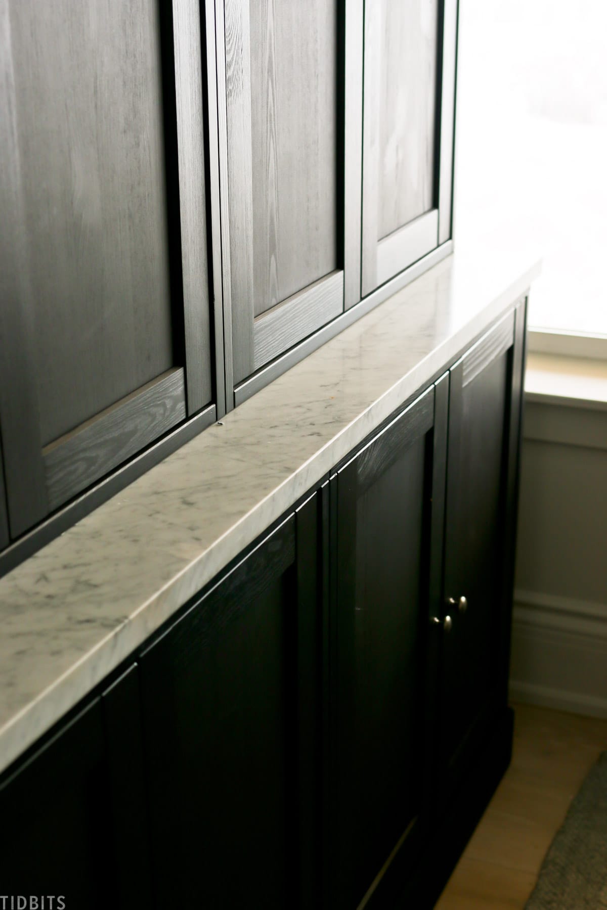 black Havsta cabinets made by IKEA