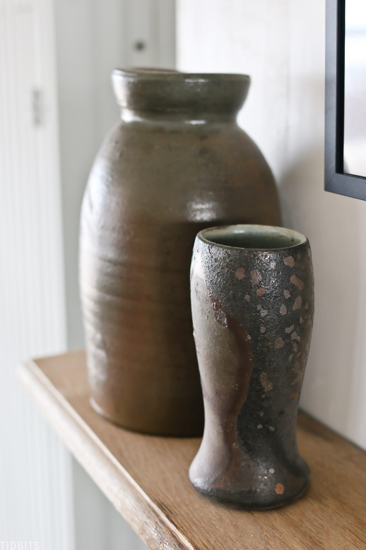 antique ceramic vase placed on a mantel