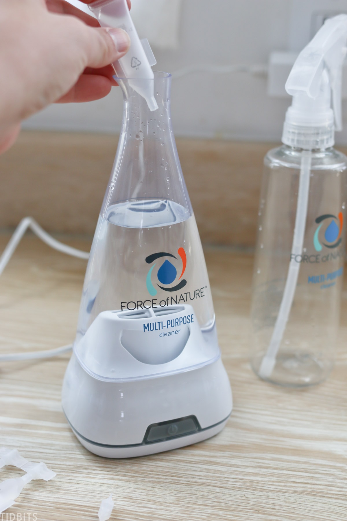 Force of Nature spray bottle and electrifier filled with disinfectant solution