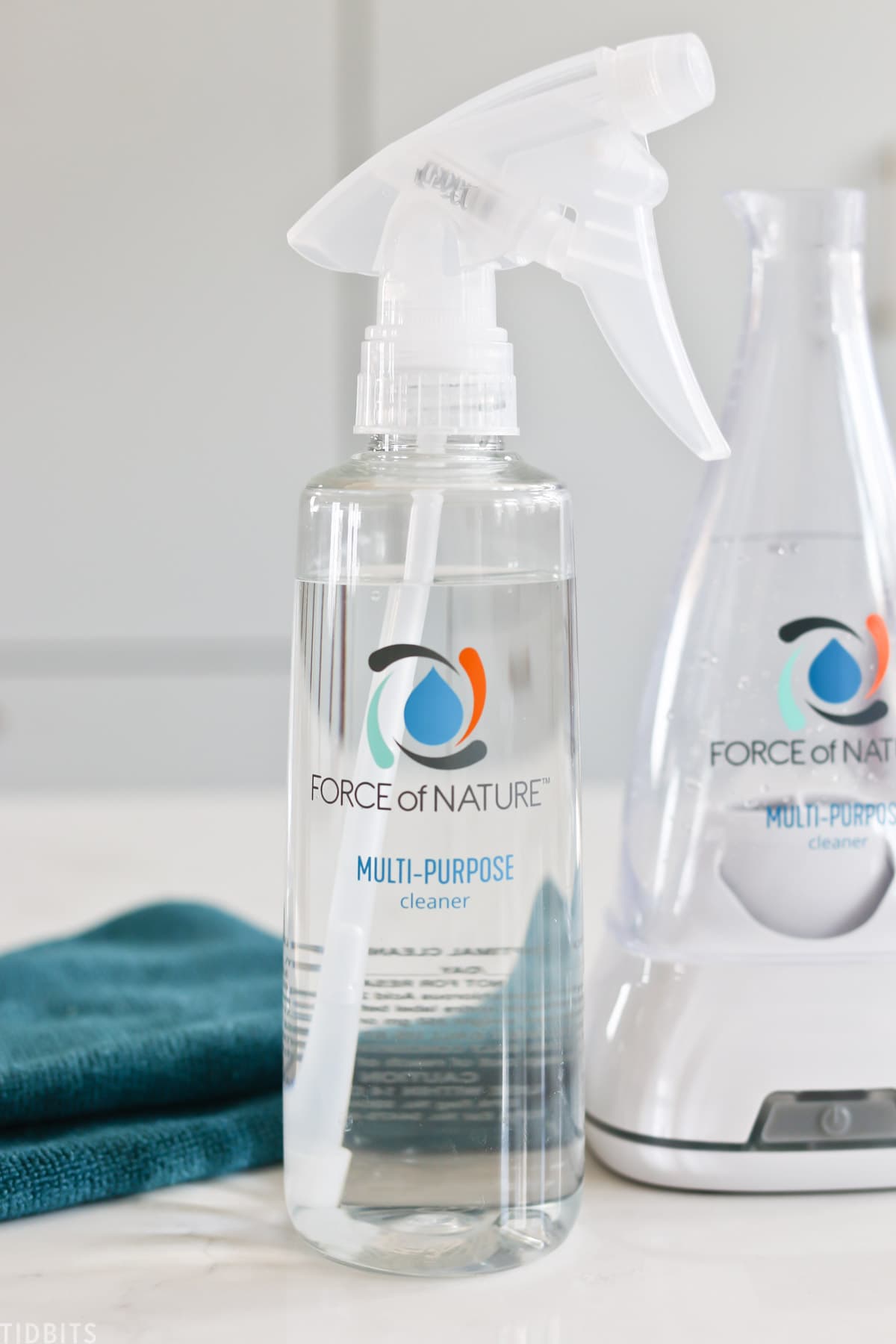 Force of Nature spray bottle that's filled with disinfectant spray