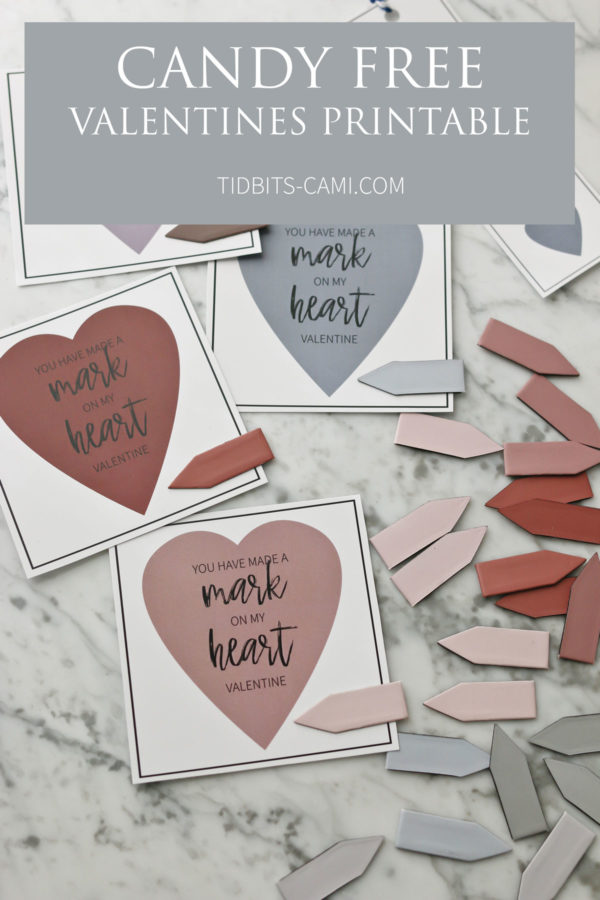 Valentine cards and magnetic book markers on a table