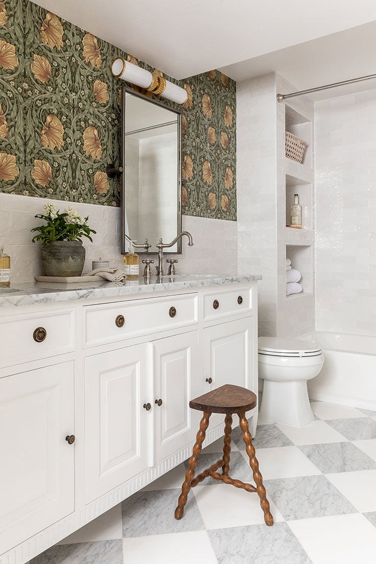 stone and ceramic floor tiling in a vintage bathroom design