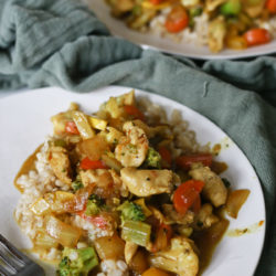 Plate of Orange Ginger stir fry with chicken, rice and vegetables