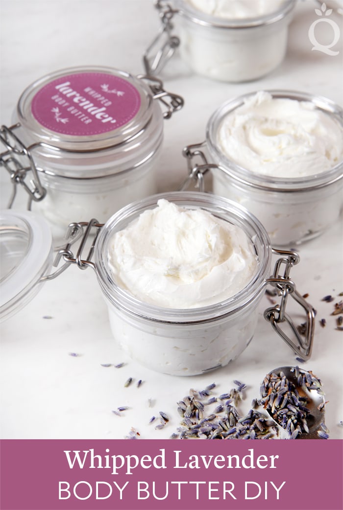 Small jars of whipped lavender body butter set on a table