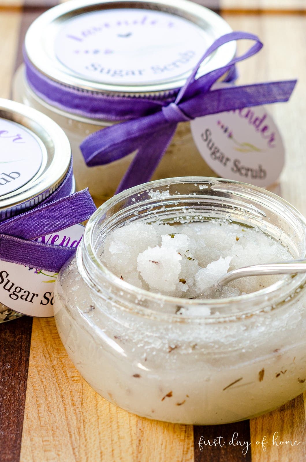 Glass jars of homemade lavender sugar scrub