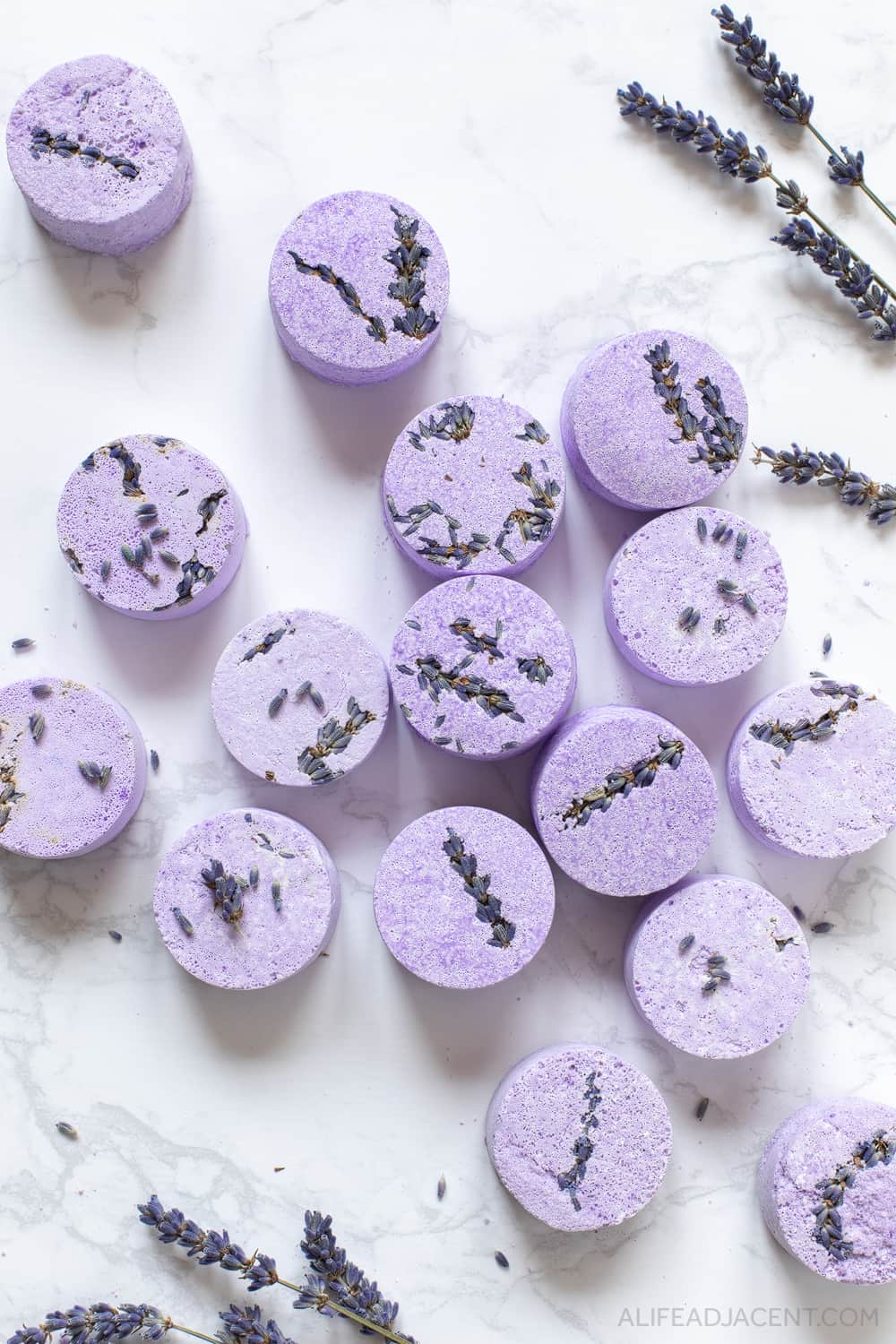 A group of purple DIY lavender shower steamer tablets