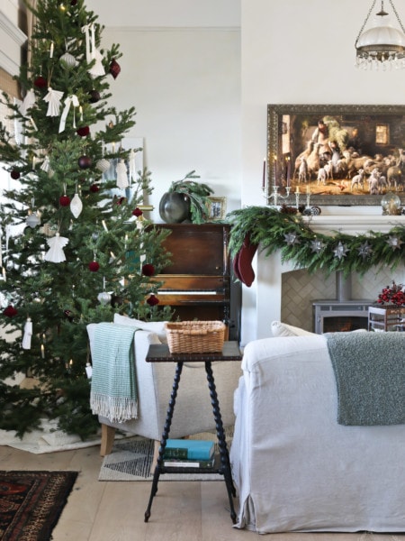 A decorated Christmas tree in a a farmhouse living room