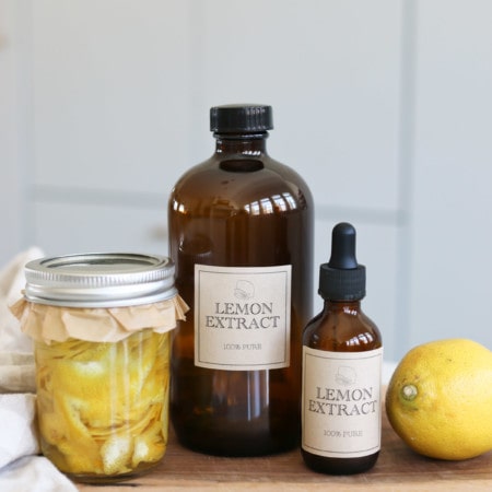 Glass jars and bottles of homemade lemon extract
