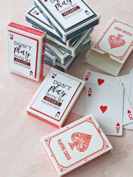 Stacks of playing cards and sit on a table