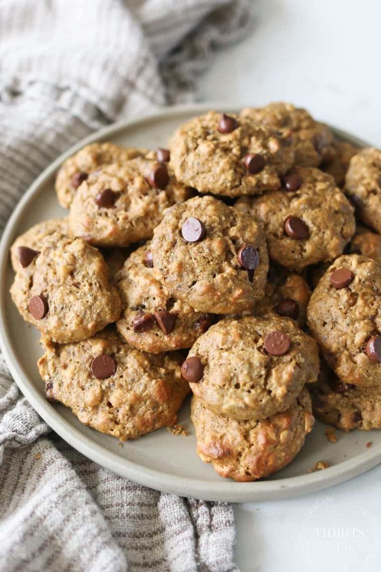 A pile of chocolate chip garbanzo bean cookies on a serving plate