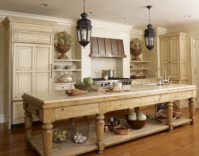 A barndonimium kitchen with a flat ceiling and large island