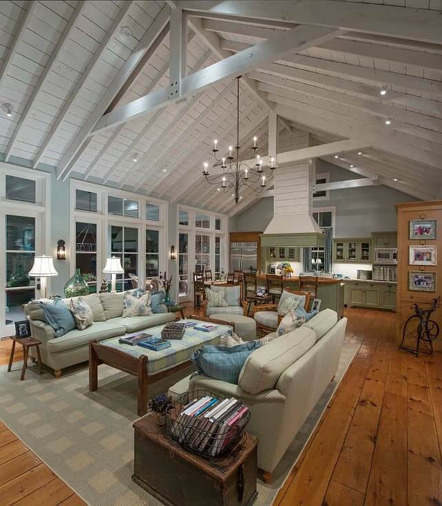 A large barndominium interior featuring a living room and kitchen 