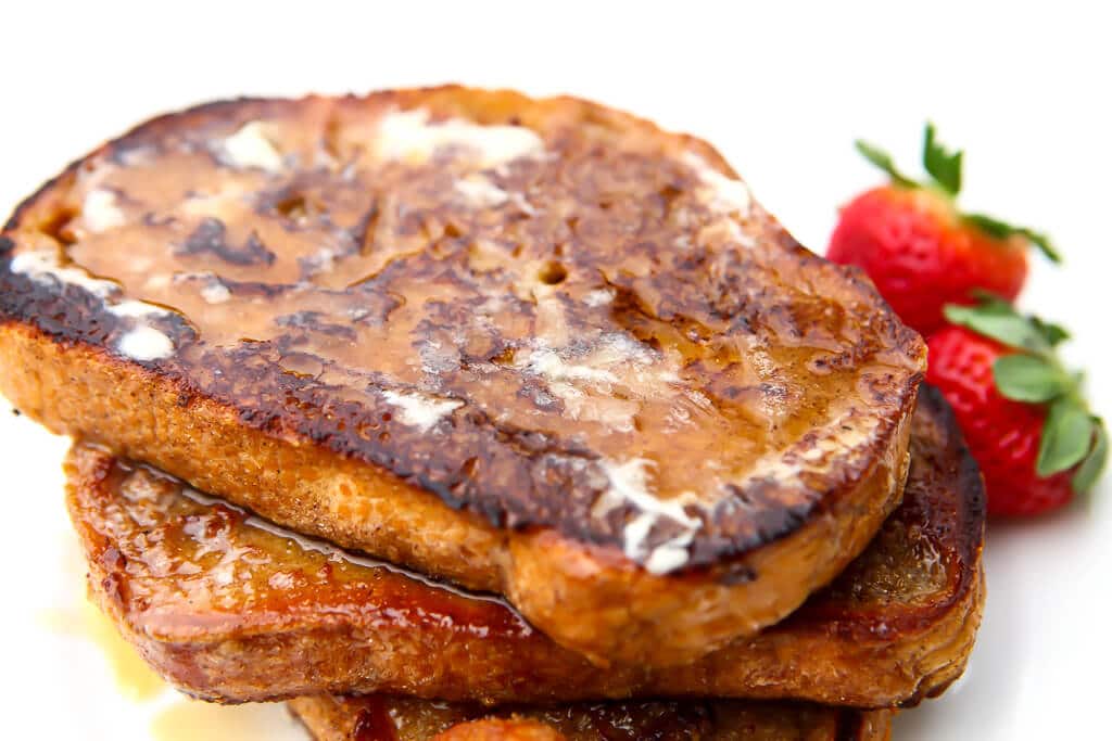 Slices of vegan french toast made using garbanzo bean flour in the recipe